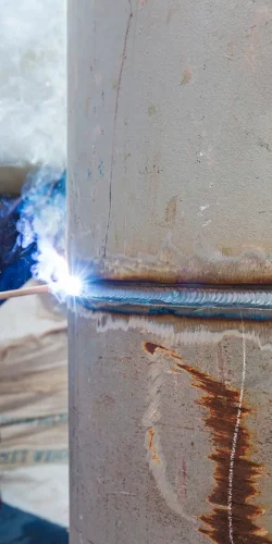 welding-male-worker-metal-is-part-machinery-nozzle-pipeline-construction-petroleum-oil-gas-_1_